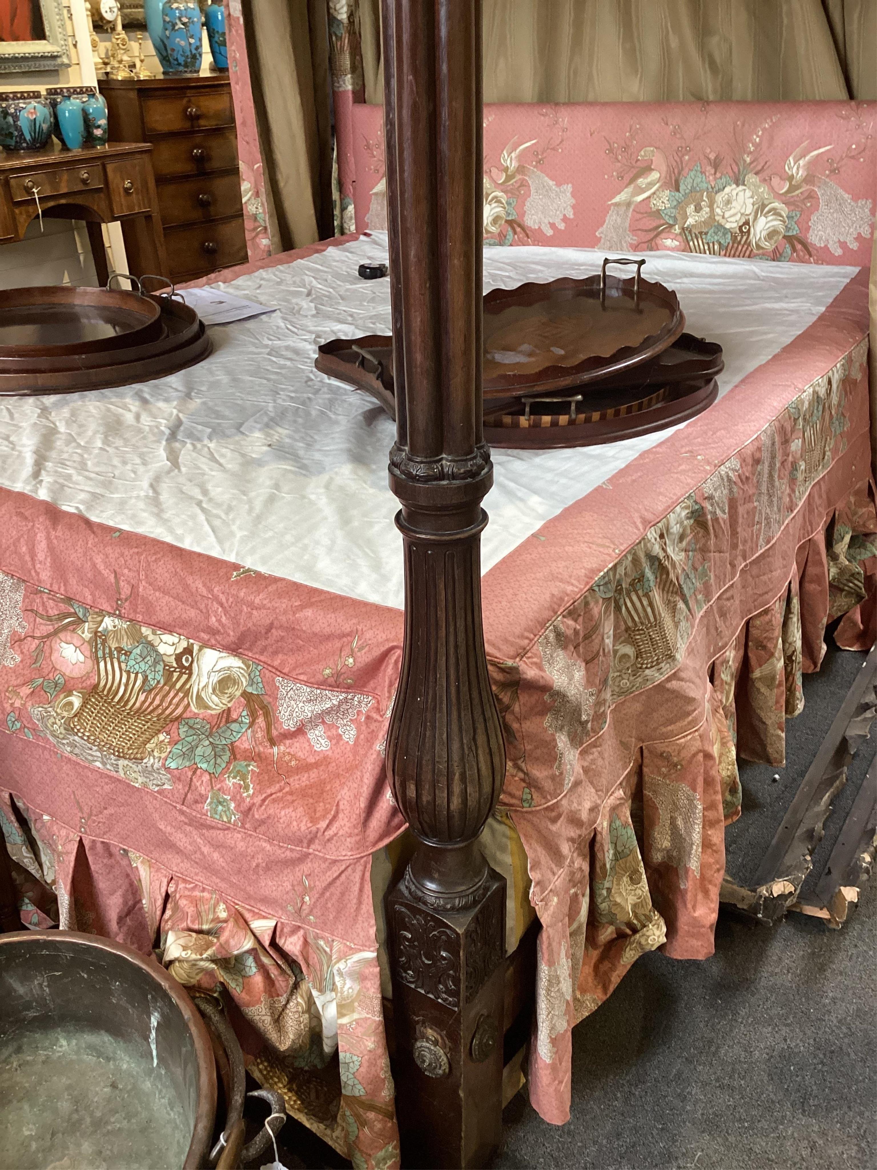 A George III style mahogany four poster bedstead